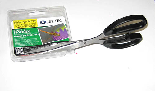 Jet Tec Schere an Schachtel